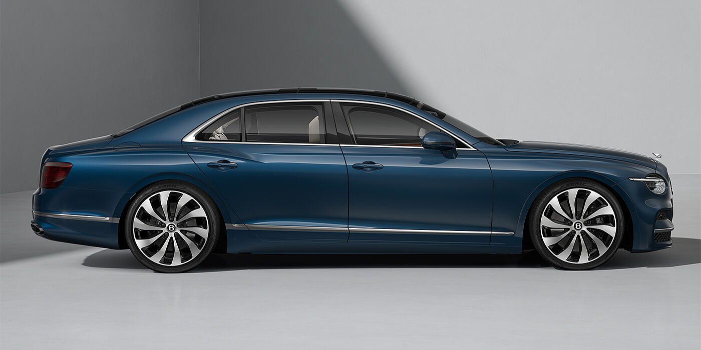 Emil Frey Exclusive Cars GmbH | Bentley München New Bentley Flying Spur sedan in Marlin blue paint profile with 22" Ten Spoke Black Painted and Bright Machined wheels