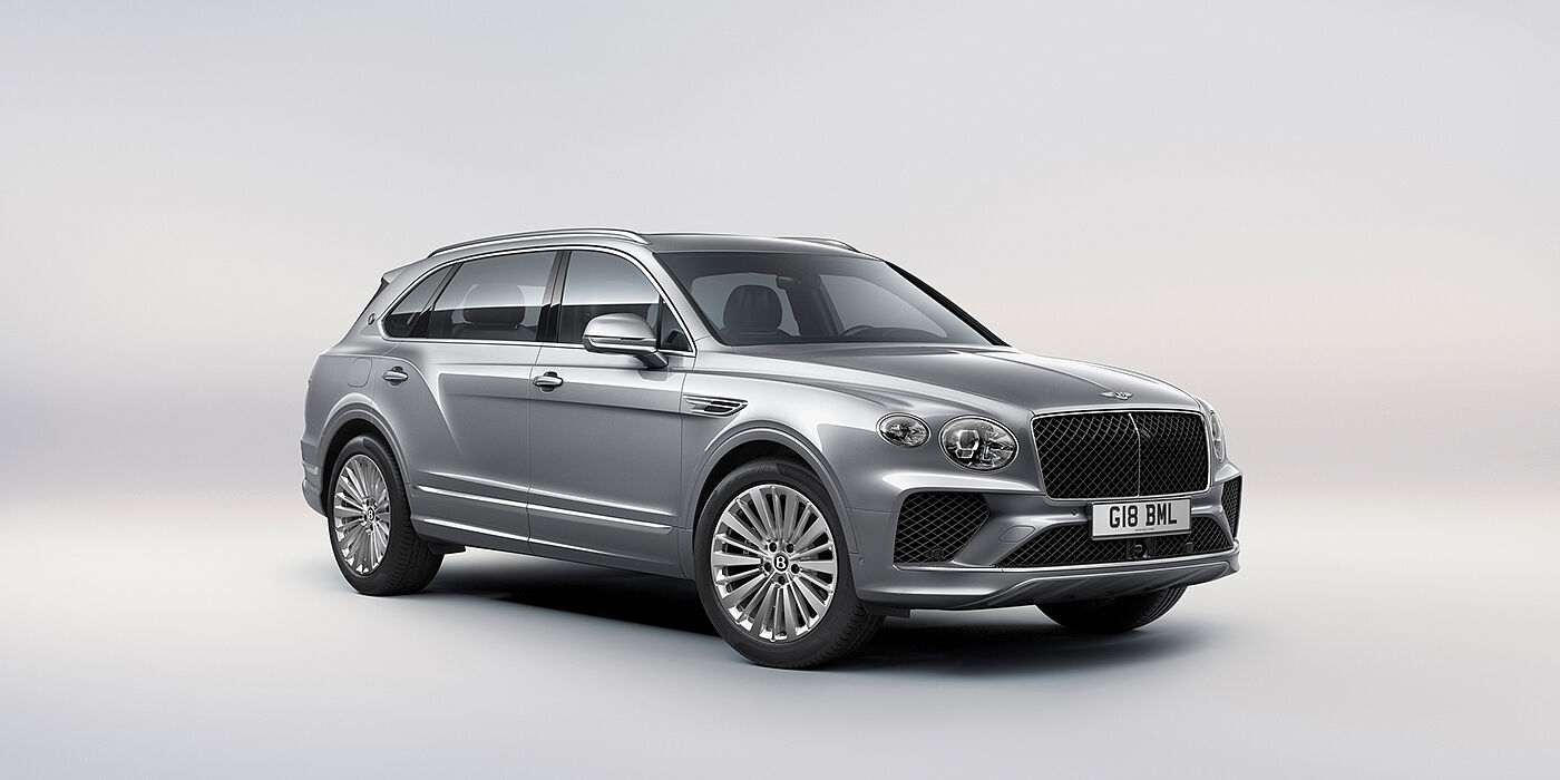 Emil Frey Exclusive Cars GmbH | Bentley München Bentley Bentayga Extended Wheelbase luxury SUV front three quarter view in Moonbeam paint with 21 inch five spoke painted wheels