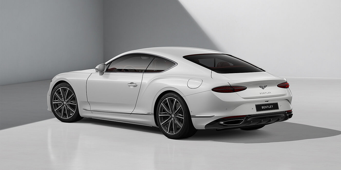 Emil Frey Exclusive Cars GmbH | Bentley München Bentley Continental GT coupe in Snow Quartz paint and 21" Ten Spoke wheels - rear 3/4