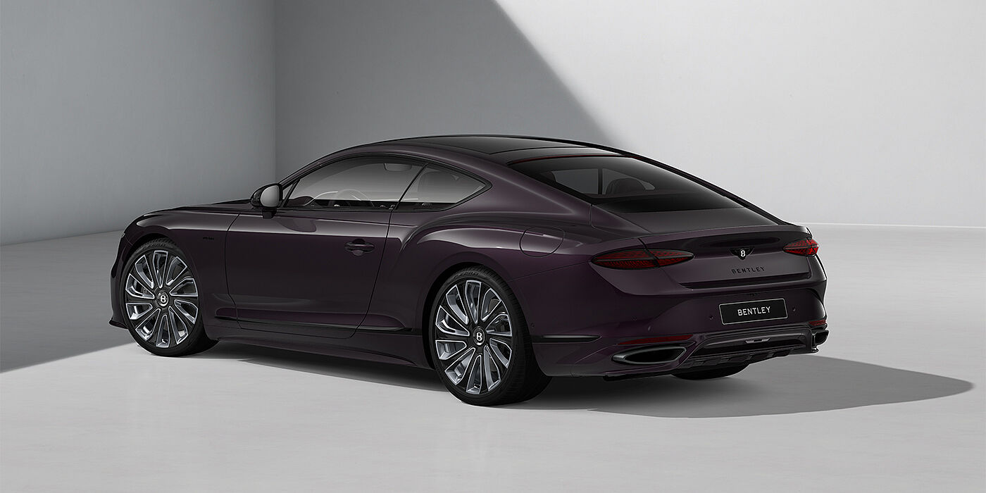 Emil Frey Exclusive Cars GmbH | Bentley München Bentley Continental GT Mulliner coupe in Damson paint and 22" Mulliner wheels - rear 3/4