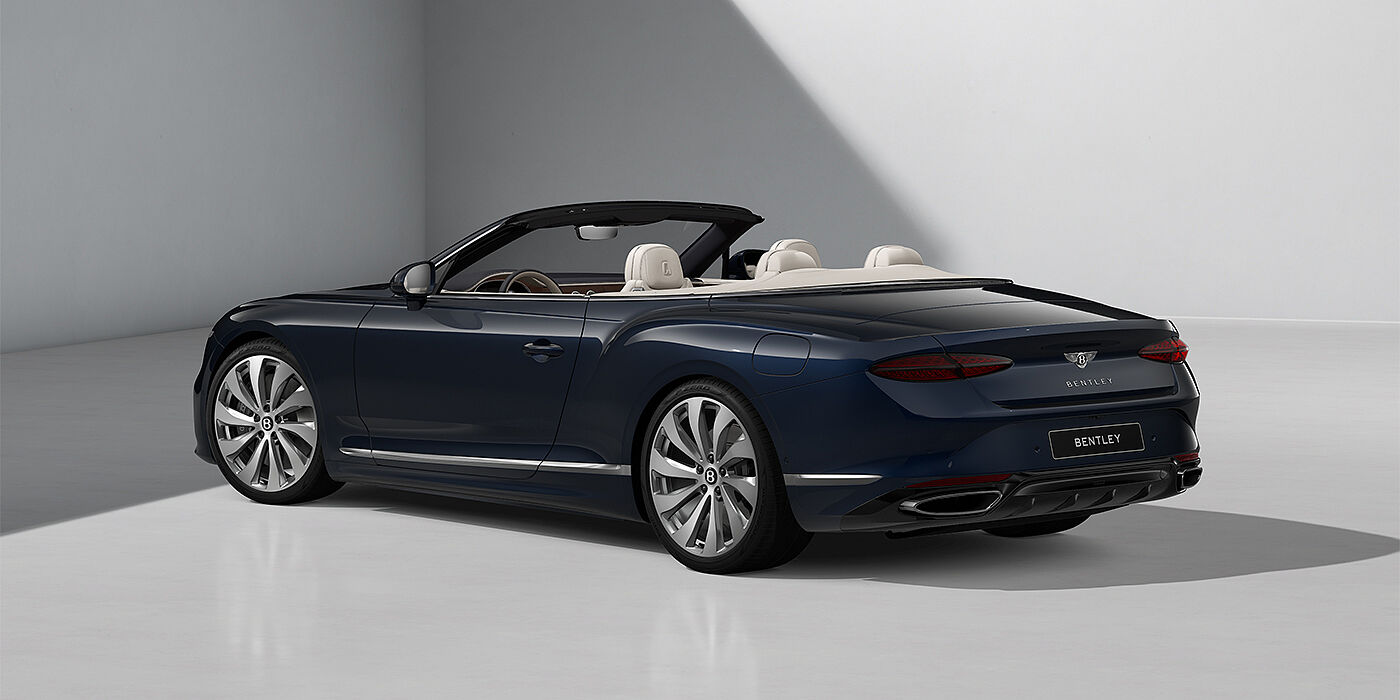 Emil Frey Exclusive Cars GmbH | Bentley München Bentley Continental GTC convertible in Dark Sapphire paint and 22" Ten Spoke wheels - rear 3/4