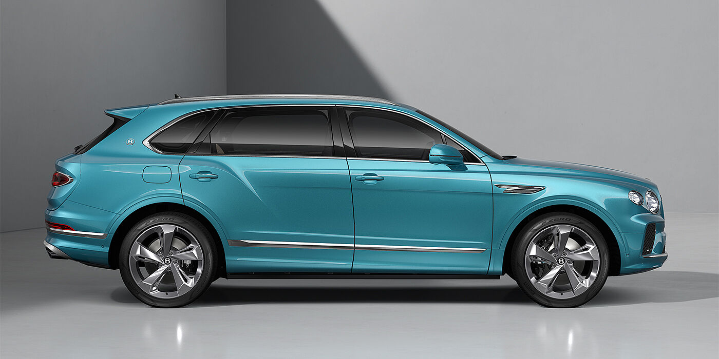 Emil Frey Exclusive Cars GmbH | Bentley München Bentley Bentayga EWB SUV in Light Windsor Blue paint and 22" Five Spoke Directional Polished wheels - profile