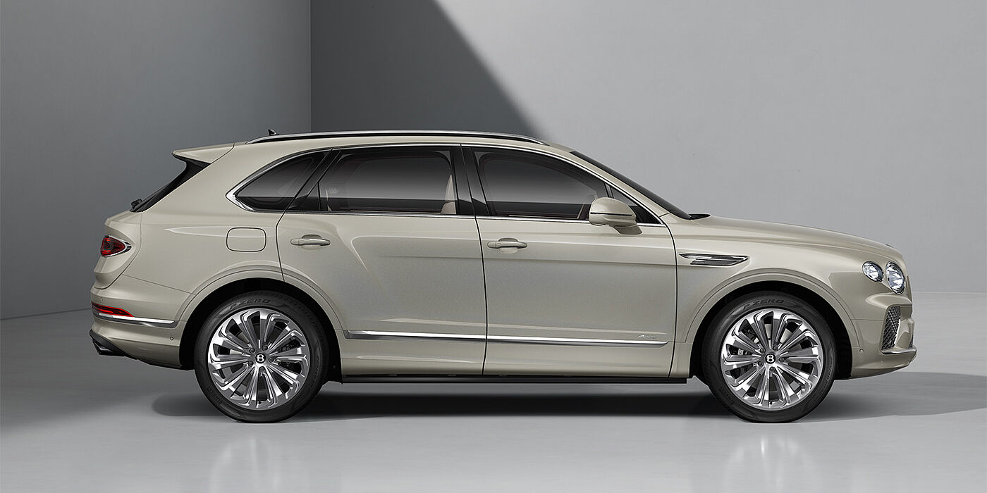 Emil Frey Exclusive Cars GmbH | Bentley München Bentley Bentayga Azure SUV in White Sand paint and 22" Ten Spoke Polished wheels ls - profile