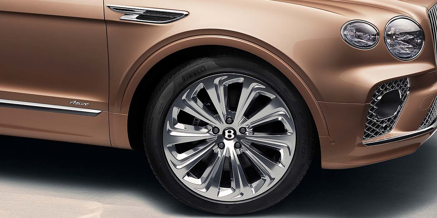 Emil Frey Exclusive Cars GmbH | Bentley München Bentley Bentayga EWB Azure SUV in Rose Gold paint 22 inch wheel