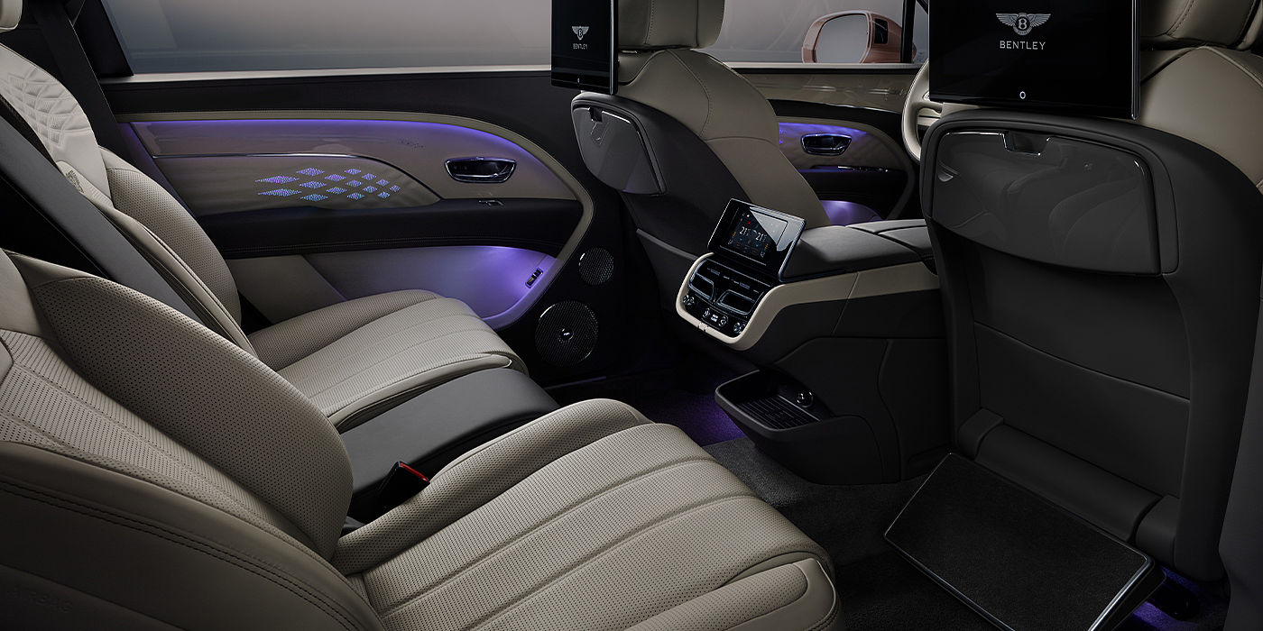 Emil Frey Exclusive Cars GmbH | Bentley München Bentley Bentayga EWB Azure SUV rear interior with Bentley Diamond Illumination