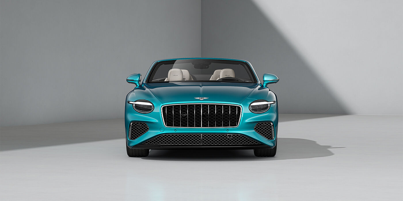 Emil Frey Exclusive Cars GmbH | Bentley München Bentley Continental GTC Azure convertible in Topaz Blue paint and 22" Azure wheels - full front