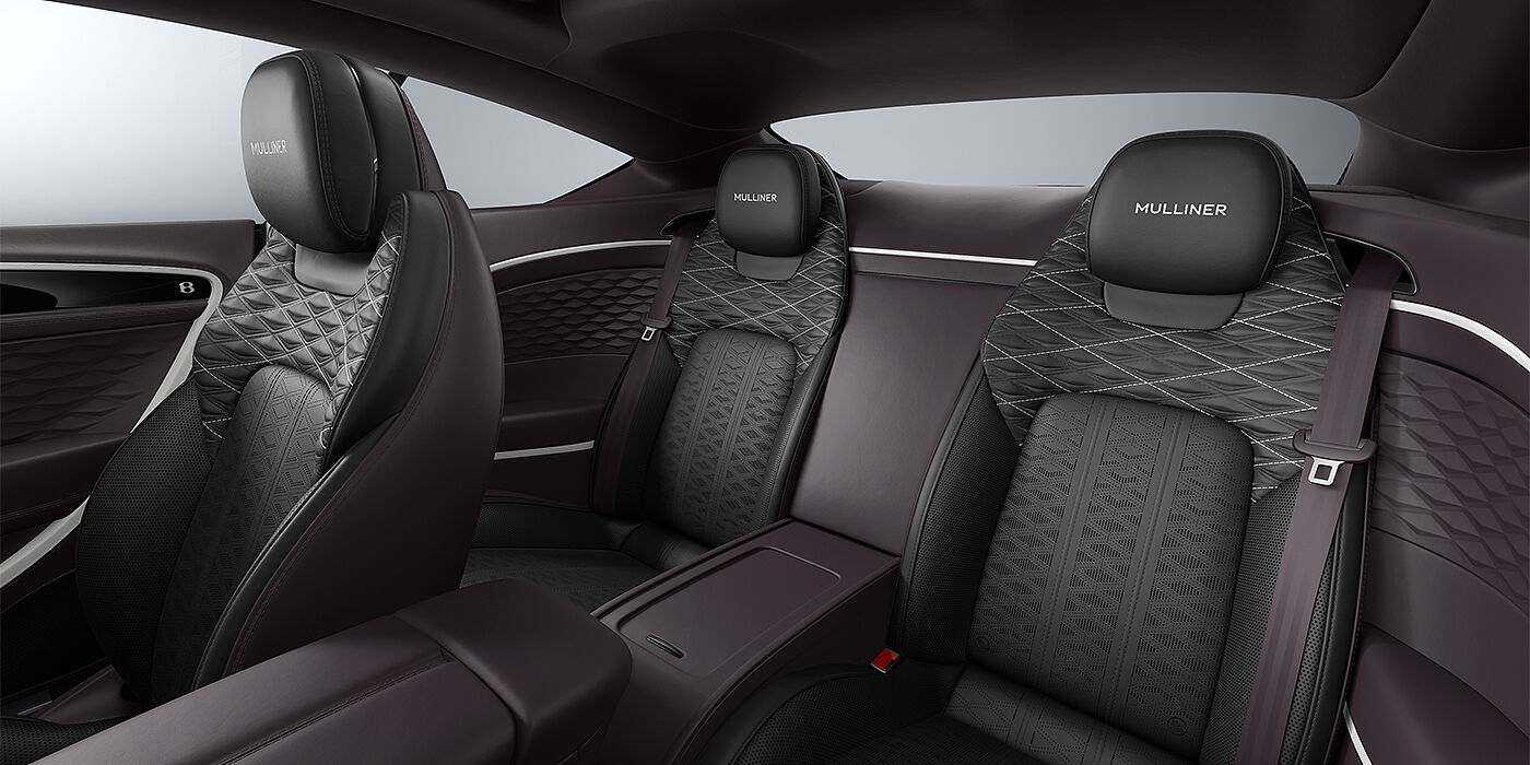 Emil Frey Exclusive Cars GmbH | Bentley München Bentley Continental GT Mulliner coupe rear interior in Beluga black and Damson hides with white accent hide