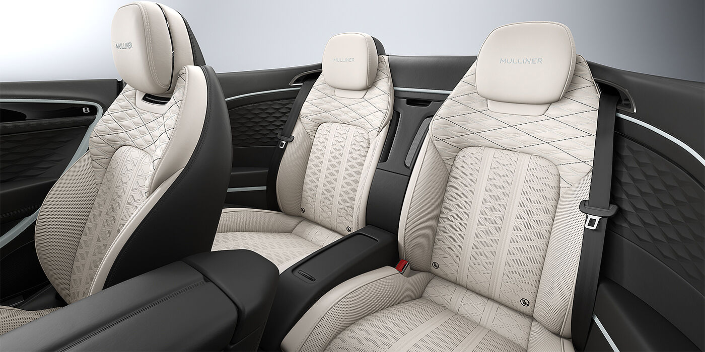 Emil Frey Exclusive Cars GmbH | Bentley München Bentley Continental GTC Mulliner convertible rear interior in Linen and Beluga black hides with Breeze accent hide