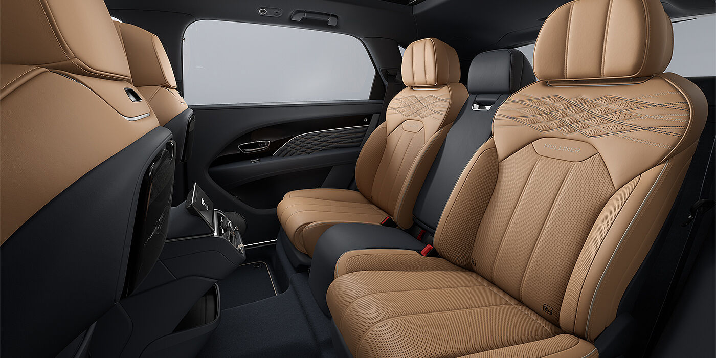 Emil Frey Exclusive Cars GmbH | Bentley München Bentley Bentayga EWB Mulliner SUV rear interior in Camel and Brunel hides with Mulliner contrast stitching