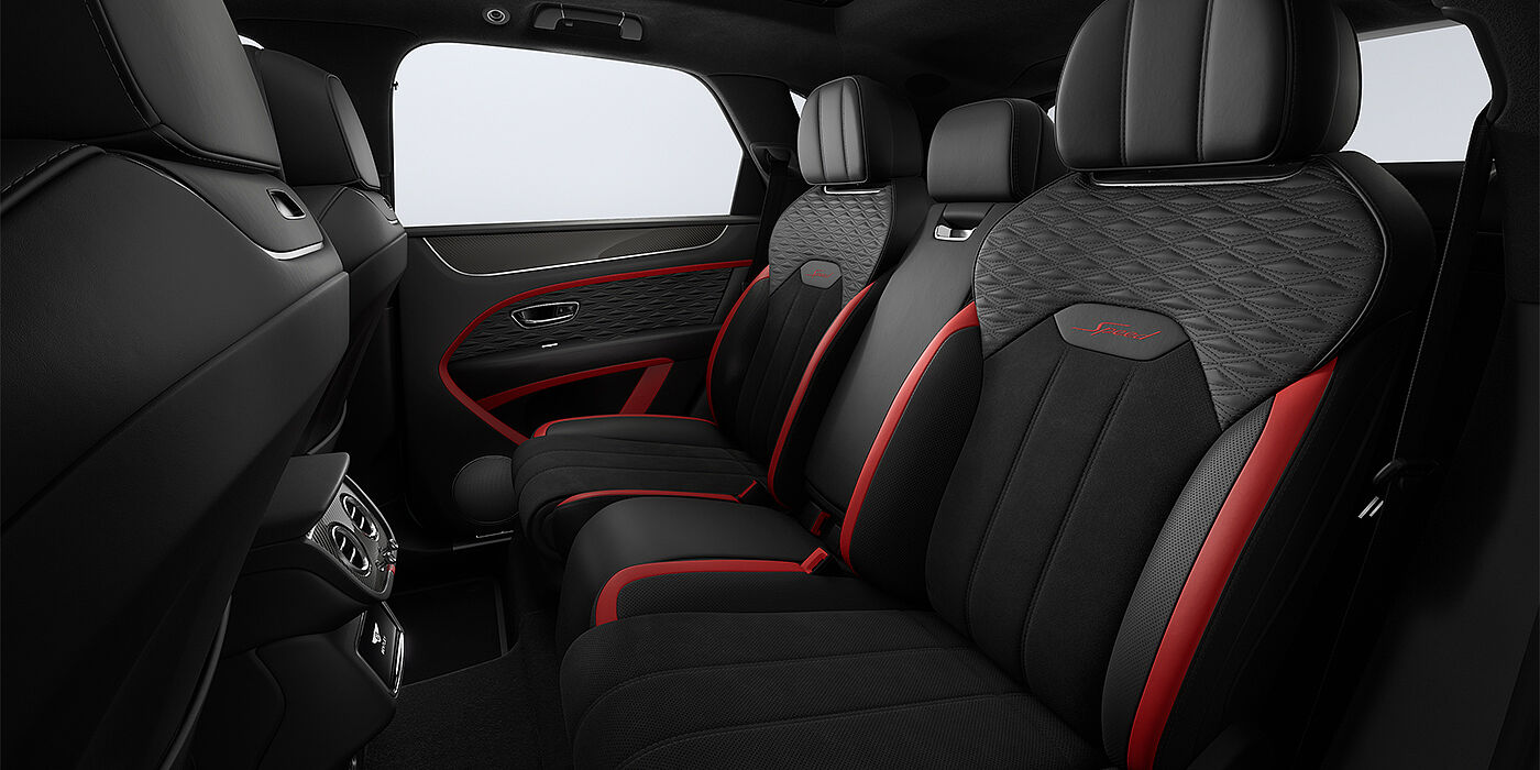 Emil Frey Exclusive Cars GmbH | Bentley München Bentley Bentayga Speed SUV rear interior in Pillar Box Red and Beluga black hides and Speed seat stitching