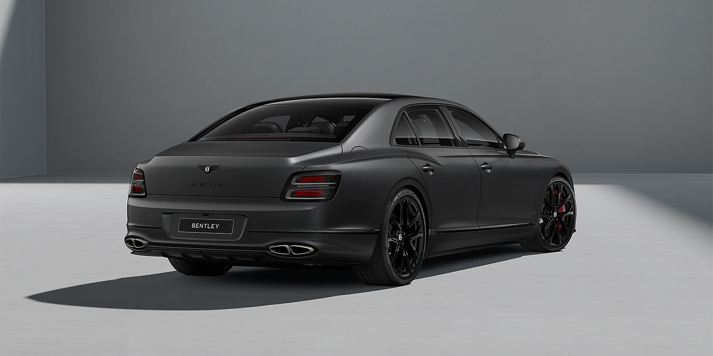 Emil Frey Exclusive Cars GmbH | Bentley München New Bentley Flying Spur S sedan in Anthracite Satin  paint rear 3/4 with 22" Sports  wheels