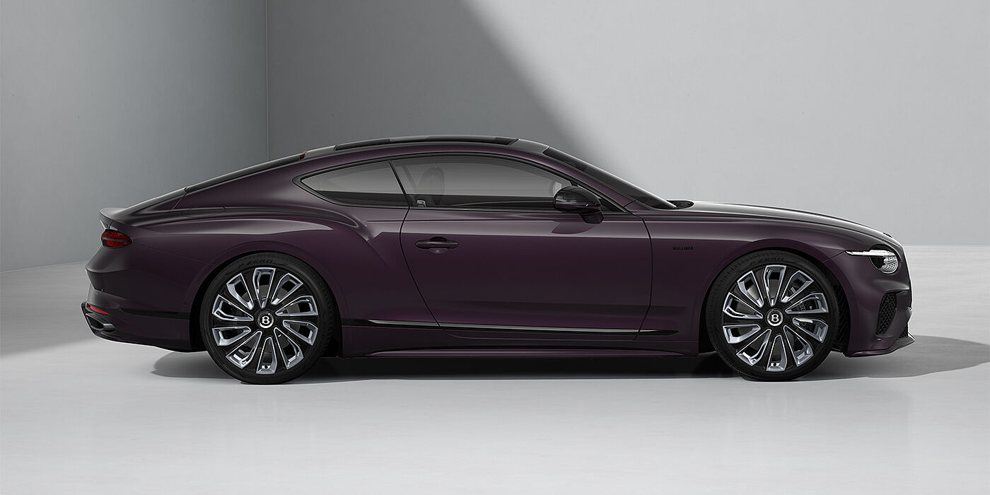 Emil Frey Exclusive Cars GmbH | Bentley München Bentley Continental GT Mulliner coupe in Damson paint and 22" Mulliner wheels - profile 3/4