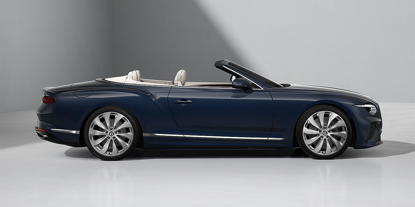 Emil Frey Exclusive Cars GmbH | Bentley München Bentley Continental GTC convertible in Dark Sapphire paint and 22" Ten Spoke wheels - profile