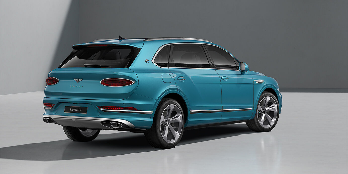 Emil Frey Exclusive Cars GmbH | Bentley München Bentley Bentayga EWB SUV in Light Windsor Blue paint and 22" Five Spoke Directional Polished wheels - rear ¾