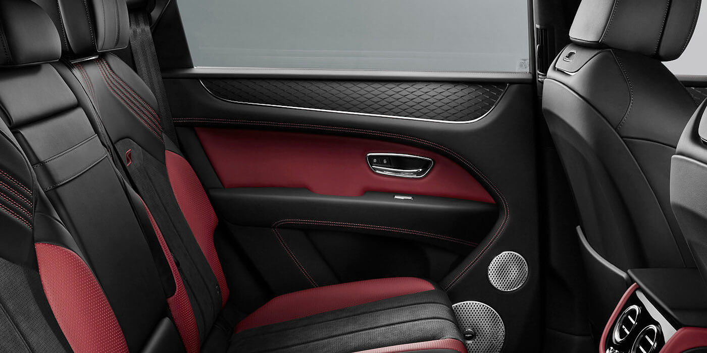 Emil Frey Exclusive Cars GmbH | Bentley München Bentley Bentayga S SUV rear interior in Beluga black and Hotspur red hide