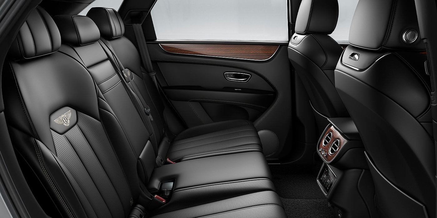 Emil Frey Exclusive Cars GmbH | Bentley München Bentley Bentayga SUV rear interior in Beluga black hide