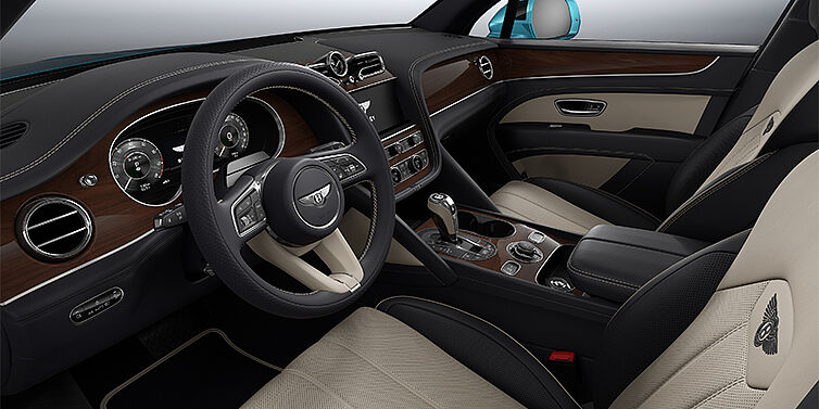 Emil Frey Exclusive Cars GmbH | Bentley München Bentley Bentayga EWB SUV front interior in Portland and Imperial Blue hides with Crown Cut Walnut veneer