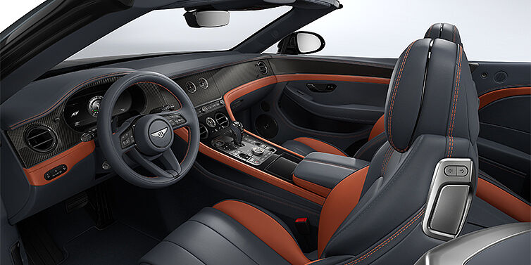 Emil Frey Exclusive Cars GmbH | Bentley München Bentley Continental GTC S convertible interior in Newmarket Tan and Beluga Black hides with Carbon Fibre veneer