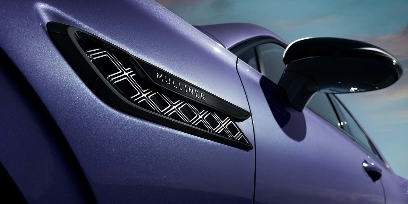 Emil Frey Exclusive Cars GmbH | Bentley München Bentley Flying Spur Mulliner in Tanzanite Purple paint with Blackline Specification wing vent