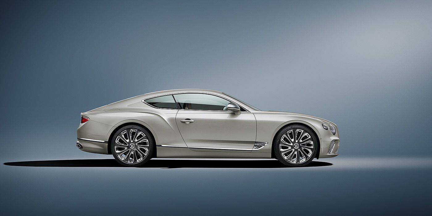 Emil Frey Exclusive Cars GmbH | Bentley München Bentley Continental GT Mulliner coupe in White Sand paint front 34