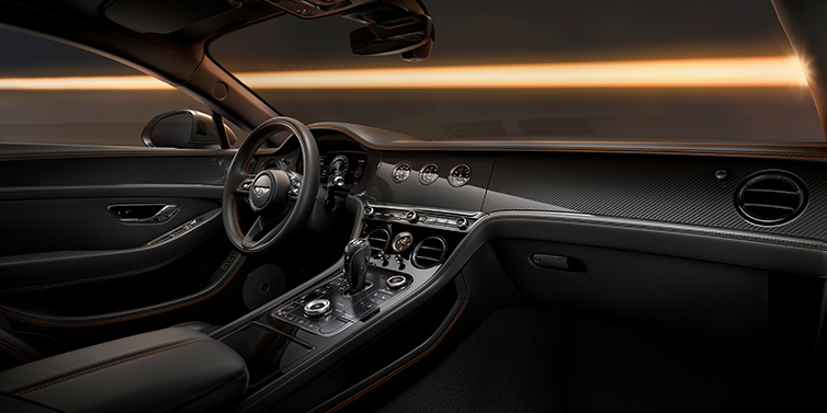 Emil Frey Exclusive Cars GmbH | Bentley München Bentley Continental GT Black Edition coupe front interior with Beluga black hide and High Gloss Carbon Fibre veneer