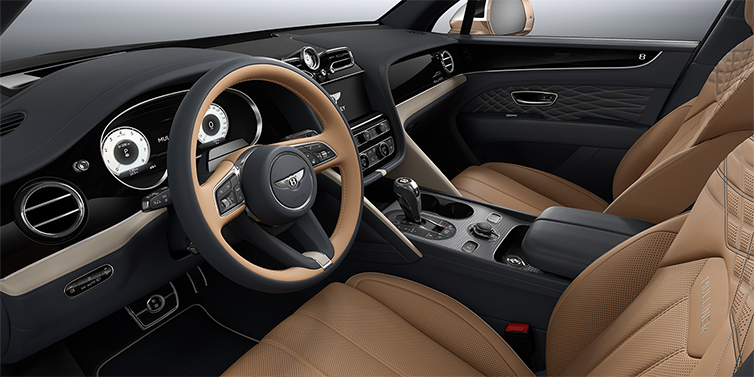 Emil Frey Exclusive Cars GmbH | Bentley München Bentley Bentayga EWB Mulliner SUV front interior in Camel and Brunel hides with Grand Black veneer and Aluminium console