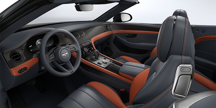 Emil Frey Exclusive Cars GmbH | Bentley München Bentley Continental GTC S convertible interior in Newmarket Tan and Beluga Black hides with Carbon Fibre veneer
