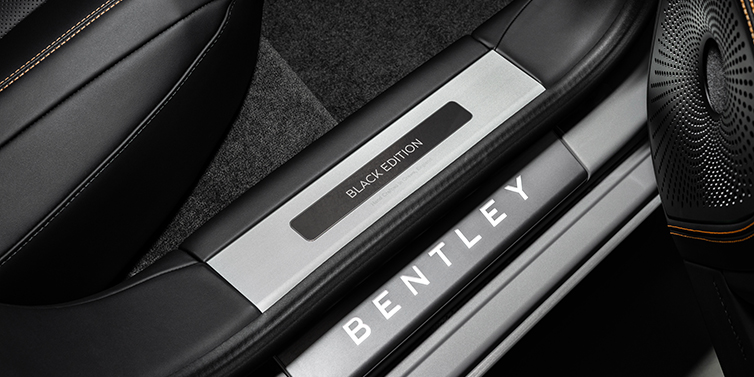Emil Frey Exclusive Cars GmbH | Bentley München Bentley Flying Spur Black Edition sedan limited edition treadplate featuring Black Edition wording with Beluga black hide