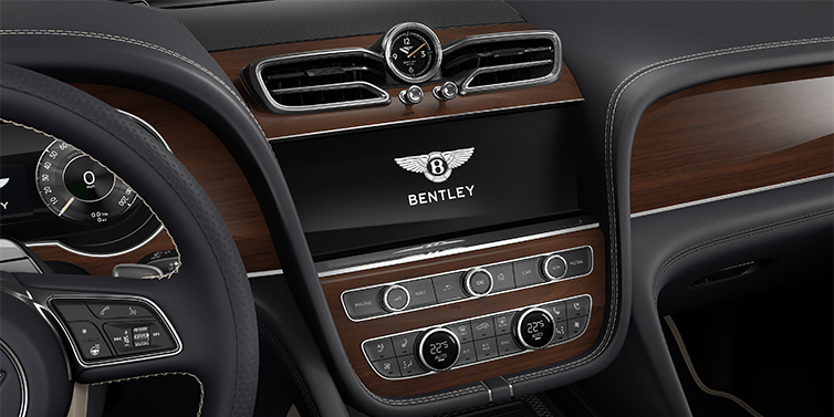 Emil Frey Exclusive Cars GmbH | Bentley München Bentley Bentayga EWB SUV centre console detail showing Bentley Wings