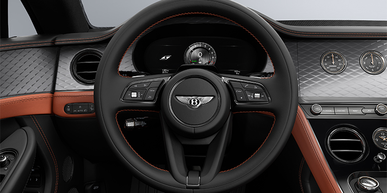Emil Frey Exclusive Cars GmbH | Bentley München Bentley Continental GT coupe steering wheel and dash in Newmarket Tan and Beluga black hides with Diamond Brushed Dark Tint Aluminium veneer