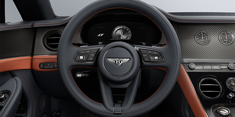Emil Frey Exclusive Cars GmbH | Bentley München Bentley Continental GTC S convertible steering wheel and dash in Newmarket Tan and Beluga Black hides with Carbon Fibre veneer